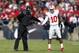 WEST LAFAYETTE, IN - NOVEMBER 2: Head coach Darrell Hazell of the Purdue Boilermakers shakes hands with Corey Brown #10 of the Ohio State Buckeyes after he tried to make a reception along the sideline during the first half of the game at Ross-Ade Stadium