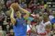 HOUSTON, TX - NOVEMBER 01: Dwight Howard #12 of the Houston Rockets complains to the official that he was hit by an elbow from Dirk Nowitzki #41 of the Dallas Mavericks in the fourth quarter at Toyota Center on November 1, 2013 in Houston, Texas. NOTE TO