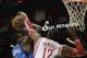 HOUSTON, TX - NOVEMBER 01: Dwight Howard #12 of the Houston Rockets blocks a shot attempt by Samuel Dalembert #1 of the Dallas Mavericks at Toyota Center on November 1, 2013 in Houston, Texas. NOTE TO USER: User expressly acknowledges and agrees that, by