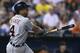 KANSAS CITY, MO - SEPTEMBER 6: Omar Infante #4 of the Detroit Tigers hits a three-run double in the fifth inning against the Kansas City Royals at Kauffman Stadium on September 6, 2013 in Kansas City, Missouri. (Photo by Ed Zurga/Getty Images)