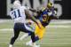 ST. LOUIS, MO - NOVEMBER 3: Zac Stacy #30 of the St. Louis Rams runs against the Tennessee Titans in the fourth quarter at the Edward Jones Dome on November 3, 2013 in St. Louis, Missouri. (Photo by Michael Thomas/Getty Images)