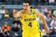 ARLINGTON, TX - MARCH 31: Mitch McGary #4 of the Michigan Wolverines reacts in the first half against the Florida Gators during the South Regional Round Final of the 2013 NCAA Men's Basketball Tournament at Dallas Cowboys Stadium on March 31, 2013 in Arl