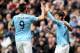 MANCHESTER, ENGLAND - NOVEMBER 02: David Silva of Manchester City celebrates scoring the second goal with his team-mates during the Barclays Premier League match between Manchester City and Norwich City at Etihad Stadium on November 2, 2013 in Manchester