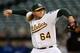 OAKLAND, CA - JULY 29: A.J. Griffin #64 of the Oakland Athletics pitches in the fourth inning against the Toronto Blue Jays at O.co Coliseum on July 29, 2013 in Oakland, California. (Photo by Thearon W. Henderson/Getty Images)