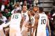 SALT LAKE CITY, UT - OCTOBER 30: Mike Harris #33 of the Utah Jazz talks to teammates Derrick Favors #15, Alec Burks #10 and Rudy Gobert #27 during a timeout against the Oklahoma City Thunder at EnergySolutions Arena on October 30, 2013 in Salt Lake City,