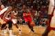 MIAMI, FL - NOVEMBER 3: John Wall #2 of the Washington Wizards drives against Shane Battier #31 of the Miami Heat on November 3, 2013 at American Airlines Arena in Miami, Florida. NOTE TO USER: User expressly acknowledges and agrees that, by downloading a