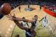 NEW ORLEANS, LA - NOVEMBER 2: Jeff Adrien #4 of the Charlotte Bobcats shoots against Anthony Davis #23 of the New Orleans Pelicans on November 2, 2013 at the New Orleans Arena in New Orleans, Louisiana. NOTE TO USER: User expressly acknowledges and agrees