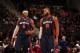 AUBURN HILLS, MI - NOVEMBER 3: Josh Smith #6 talks to Greg Monroe #10 of the Detroit Pistons against the Boston Celtics during the game on November 3, 2013 at The Palace of Auburn Hills in Auburn Hills, Michigan. NOTE TO USER: User expressly acknowledges