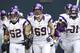 SEATTLE, WA - NOVEMBER 04: Jared Allen #69 of the Minnesota Vikings takes the field with Chad Greenway #52 of the Minnesota Vikings and D'Aundre Reed #91 of the Minnesota Vikings before a game against the Seattle Seahawks at CenturyLink Field on November