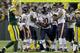 GREEN BAY, WI - NOVEMBER 04: Julius Peppers #90 of the Chicago Bears celebrates after making an interception during the first quarter against the Green Bay Packers at Lambeau Field on November 04, 2013 in Green Bay, Wisconsin. (Photo by Mike McGinnis/Gett