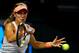 TOKYO, JAPAN - SEPTEMBER 26: Eugenie Bouchard of Canada in action during her women's singles quarter final match against Venus Williams of the United States during day five of the Toray Pan Pacific Open at Ariake Colosseum on September 26, 2013 in Tokyo,