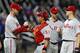 NEW YORK, NY - AUGUST 26: Kyle Kendrick #38 catcher Carlos Ruiz #51, Cliff Lee #33 and Jonathan Papelbon #58 of the Philadelphia Phillies congratulate each after defeating the New York Mets on August 26, 2013 at Citi Field in the Flushing neighborhood of