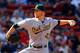 BOSTON, MA - APRIL 24: Brett Anderson #49 of the Oakland Athletics pitches against the Boston Red Sox during the game on April 24, 2013 at Fenway Park in Boston, Massachusetts. (Photo by Jared Wickerham/Getty Images)