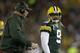 GREEN BAY, WI - NOVEMBER 04: Seneca Wallace #9 of the Green Bay Packers talks to head coach Mike McCarthy on the sidelines during the second half of play against the Chicago Bears during the game at Lambeau Field on November 04, 2013 in Green Bay, Wiscons