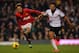 LONDON, ENGLAND - NOVEMBER 02: Kieran Richardson of Fulham pulls on the shirt of Adnan Januzaj of Manchester United during the Barclays Premier League match between Fulham and Manchester United at Craven Cottage on November 2, 2013 in London, England. (