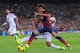 BARCELONA, SPAIN - OCTOBER 26: Neymar of FC Barcelona (R) is tackled by Raphael Varane of Real Madrid CF during the La Liga match between FC Barcelona and Real Madrid CF at Camp Nou stadium on October 26, 2013 in Barcelona, Spain. (Photo by Denis Doyle/