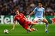 MANCHESTER, ENGLAND - OCTOBER 02: Toni Kroos of Muenchen is challenged by Samir Nasri of Manchester City during the UEFA Champions League Group D match between Manchester City and FC Bayern Muenchen at Etihad Stadium on October 2, 2013 in Manchester, Engl