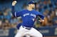 TORONTO, CANADA - JULY 27: Josh Johnson #55 of the Toronto Blue Jays delivers a pitch during MLB game action against the Houston Astros on July 27, 2013 at Rogers Centre in Toronto, Ontario, Canada. (Photo by Tom Szczerbowski/Getty Images)
