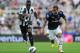 NEWCASTLE UPON TYNE, ENGLAND - AUGUST 18: Aaron Lennon of Tottenham Hotspur competes with Cheick Tiote of Newcastle United during the Barclays Premier League match between Newcastle United and Tottenham Hotspur at Sports Direct Arena on August 18, 2012 i