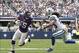 Nov 3, 2013; Arlington, TX, USA; Minnesota Vikings wide receiver Greg Jennings (15) runs the ball against Dallas Cowboys cornerback B.W. Webb (20) in the game at AT&T Stadium. The Dallas Cowboys beat the Minnesota Vikings 27-23. Mandatory Credit: Tim Hei