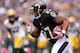 BALTIMORE, MD - OCTOBER 13: Running back Ray Rice #27 of the Baltimore Ravens rushes against the Green Bay Packers at M&T Bank Stadium on October 13, 2013 in Baltimore, Maryland. (Photo by Patrick Smith/Getty Images)