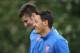 ST ALBANS, ENGLAND - NOVEMBER 05: Olivier Giroud and Mesut Oezil (R) of Arsenal attend a training session at London Colney on November 5, 2013 in St Albans, England. (Photo by Ian Walton/Getty Images)