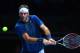 LONDON, ENGLAND - NOVEMBER 04: Juan Martin Del Potro of Argentina hits a backhand in his men's singles match against Richard Gasquet of France during day one of the Barclays ATP World Tour Finals at O2 Arena on November 4, 2013 in London, England. (Phot