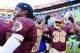 LANDOVER, MD - NOVEMBER 03: Fullback Darrel Young #36 of the Washington Redskins celebrates with quarterback Robert Griffin III #10 after scoring the game winning touchdown in overtime to give the Redskins a 30-24 win over the San Diego Chargers at FedE