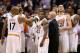 PHOENIX, AZ - NOVEMBER 01: (L-R) P.J. Tucker #17, Markieff Morris #11, Eric Bledsoe #2, Miles Plumlee #22 and Channing Frye #8 of the Phoenix Suns huddle up during a time out from the second half of the NBA game against the Utah Jazz at US Airways Center