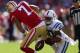 SAN FRANCISCO, CA - SEPTEMBER 22: Colin Kaepernick #7 of the San Francisco 49ers is sacked by Jerrell Freeman #50 of the Indianapolis Colts at Candlestick Park on September 22, 2013 in San Francisco, California. (Photo by Jed Jacobsohn/Getty Images)