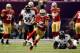 NEW ORLEANS, LA - FEBRUARY 03: Michael Crabtree #15 of the San Francisco 49ers runs for yards after the catch past Ray Lewis #52 of the Baltimore Ravens during Super Bowl XLVII at the Mercedes-Benz Superdome on February 3, 2013 in New Orleans, Louisiana.