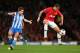 MANCHESTER, ENGLAND - OCTOBER 23: Javier Hernandez of Manchester United beats Inigo Martinez of Real Sociedead to the ball during the UEFA Champions League Group A match between Manchester United and Real Sociedad at Old Trafford on October 23, 2013 in M