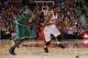 TORONTO, ON - OCTOBER 30: Gerald Wallace #45 of the Boston Celtics defends against Rudy Gay #22 of the Toronto Raptors during their NBA game at the Air Canada Centre on October 30, 2013 in Toronto, Ontario, Canada. NOTE TO USER: User expressly acknowled