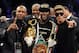 Sep 14, 2013; Las Vegas, NV, USA; From left recording artist Tank , Floyd Mayweather Jr and singer Justin Bieber appear in the ring after Mayweather defeated Canelo Alvarez by a majority decision at their WBC and WBA super welterweight titles fight at MGM