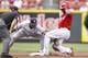 CINCINNATI, OH - JUNE 22: Brandon Phillips #4 of the Cincinnati Reds slides at second base ahead of the tag by Robinson Cano #24 of the New York Yankees at Great American Ball Park on June 22, 2011 in Cincinnati, Ohio. The Yankees defeated the Reds 4-2.