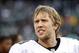 Nov 3, 2013; Oakland, CA, USA; Philadelphia Eagles quarterback Nick Foles (9) on the sidelines with teammates during the fourth quarter in a game against the Oakland Raiders at O.co Coliseum. The Eagles won 49-20. Mandatory Credit: Bob Stanton-USA TODAY
