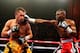 NEW YORK, NY - APRIL 13: Guillermo Rigondeaux punches Nonito Donaire during their WBO/WBA junior featherweight title unification bout at Radio City Music Hall on April 13, 2013 in New York City. (Photo by Al Bello/Getty Images)