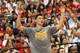 TAIPEI, TAIWAN - OCTOBER 13: Jeremy Lin #7 of the Houston Rockets celebrates from the bench during the game against the Indiana Pacers during the 2013 Global Games on October 13, 2013 at the Taipei Arena in Taipei, Taiwan. NOTE TO USER: User expressly a