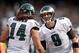 Nov 3, 2013; Oakland, CA, USA; Philadelphia Eagles quarterback Nick Foles (9) shakes hands with receiver Riley Cooper (14) after a touchdown in the third quarter against the Oakland Raiders at O.co Coliseum. The Eagles defeated the Raiders 49-20. Mandator