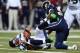 ST LOUIS, MO - OCTOBER 28: Russell Wilson #3 of the Seattle Seahawks gets sacked by William Hayes #95 the St. Louis Rams during an NFL game at Edward Jones Dome on October 28, 2013 in St Louis, Missouri. (Photo by Andy Lyons/Getty Images)
