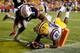 BATON ROUGE, LA - SEPTEMBER 21: Jarvis Landry #80 of the LSU Tigers dives for a touchdown after avoiding a tackle by Ryan White #19 of the Auburn Tigers at Tiger Stadium on September 21, 2013 in Baton Rouge, Louisiana. (Photo by Chris Graythen/Getty Ima