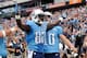 NASHVILLE, TN - SEPTEMBER 29: Tight end Delanie Walker #82 of the Tennessee Titans is congratulated by teammates after scoring a touchdown against the New York Jets at LP Field on September 29, 2013 in Nashville, Tennessee. (Photo by Frederick Breedon/G