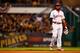 PITTSBURGH, PA - OCTOBER 01: Brandon Phillips #4 of the Cincinnati Reds reacts to an error in the fourth inning against the Pittsburgh Pirates during the National League Wild Card game at PNC Park on October 1, 2013 in Pittsburgh, Pennsylvania. (Photo b