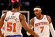 NEW YORK, NY - NOVEMBER 05: Carmelo Anthony #7 talks with Metta World Peace #51 of the New York Knicks in the second half against the Charlotte Bobcats at Madison Square Garden on November 5, 2013 in New York City.The Charlotte Bobcats defeated the New Y