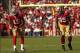 November 13, 2011; San Francisco, CA, USA; San Francisco 49ers wide receiver Michael Crabtree (15) and tight end Vernon Davis (85) stand at the line of scrimmage against the New York Giants in the second quarter at Candlestick Park. The 49ers defeated the