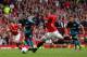 MANCHESTER, ENGLAND - AUGUST 28: Wayne Rooney of Manchester United scores his third goal from the penalty spot during the Barclays Premier League match between Manchester United and Arsenal at Old Trafford on August 28, 2011 in Manchester, England. (Pho