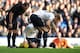 LIVERPOOL, ENGLAND - NOVEMBER 03: Hugo Lloris of Tottenham Hotspur lies injured during the Barclays Premier League match between Everton and Tottenham Hotspur at Goodison Park on November 03, 2013 in Liverpool, England. (Photo by Chris Brunskill/Getty Ima