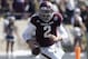 COLLEGE STATION, TX - OCTOBER 26: Johnny Manziel #2 of the Texas A&M Aggies rolls out looking for a receiver against the Vanderbilt Commodores at the end of the second quarter at Kyle Field on October 26, 2013 in College Station, Texas. (Photo by Bob Le