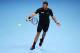 LONDON, ENGLAND - NOVEMBER 06: Stanislas Wawrinka of Switzerland plays a backhand in his men's singles match against Rafael Nadal of Spain during day three of the Barclays ATP World Tour Finals at O2 Arena on November 6, 2013 in London, England. (Photo b