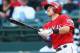 ARLINGTON, TX - MAY 04: Ian Kinsler #5 of the Texas Rangers hits a solo homerun against the Boston Red Sox at Rangers Ballpark in Arlington on May 4, 2013 in Arlington, Texas. (Photo by Ronald Martinez/Getty Images)